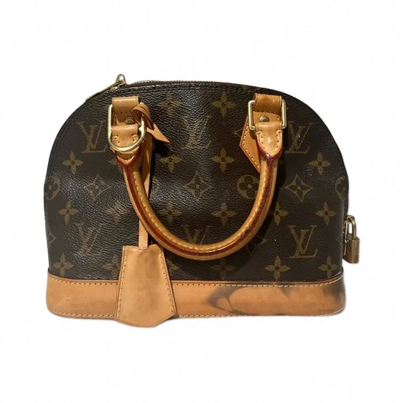 Louis Vuttion - Picture 2 of 2